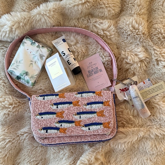 made in India Handbags - NWT Viral pink sardine beaded bag w/bonus tissues and makeup samples